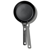 Black non-stick frying pan with a long handle.