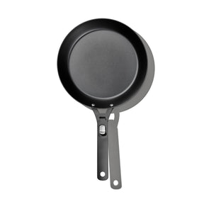 Black non-stick frying pan with a handle.