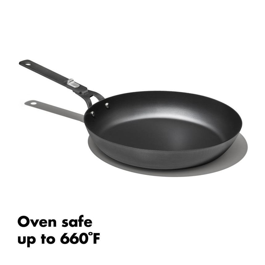 Black non-stick frying pan with a long handle.