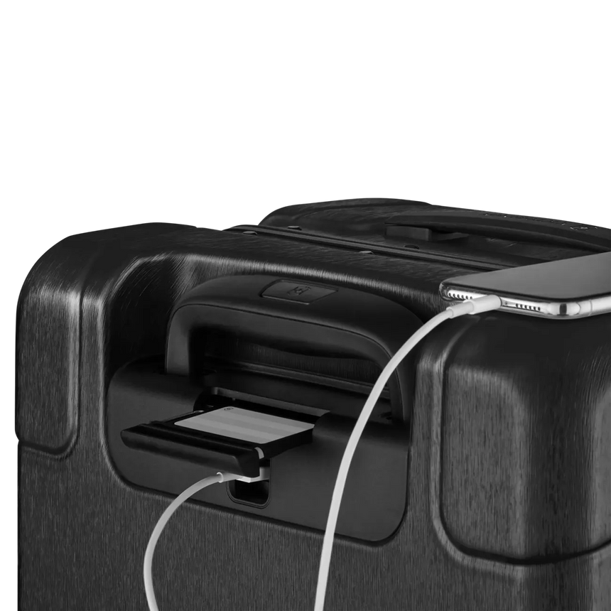 Black suitcase with a built-in USB charging port.