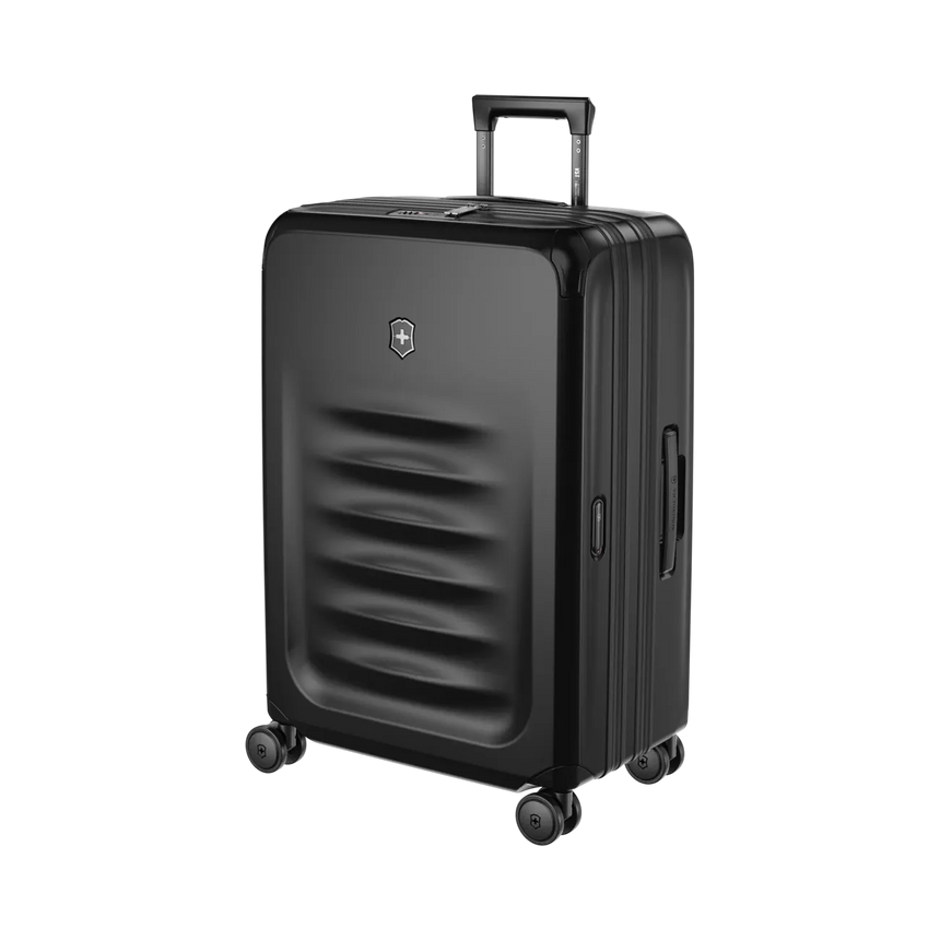Black hardshell rolling suitcase with horizontal ridges on the front.