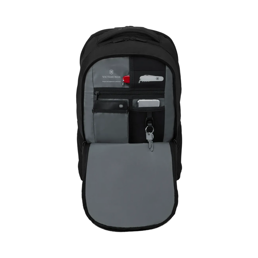Black backpack with an open front compartment revealing organized storage pockets.
