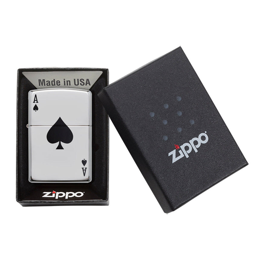 Zippo lighter with an ace of spades design in its packaging.