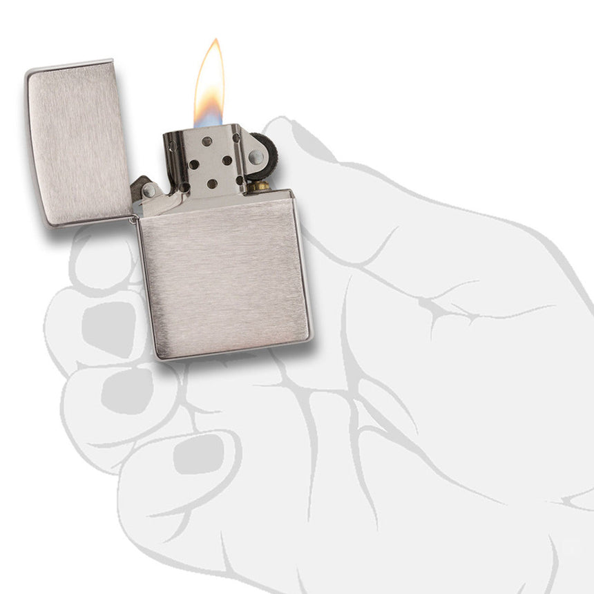 Metal cigarette lighter with an open flame.