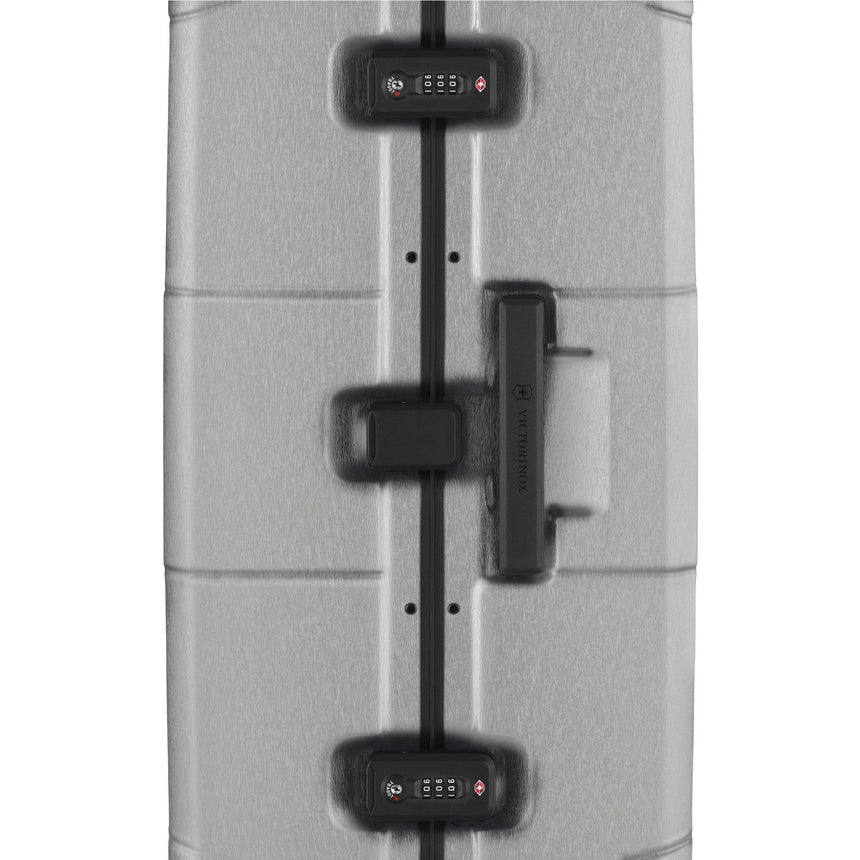 Suitcase with electronic locks and a handle visible through an X-ray-like image.