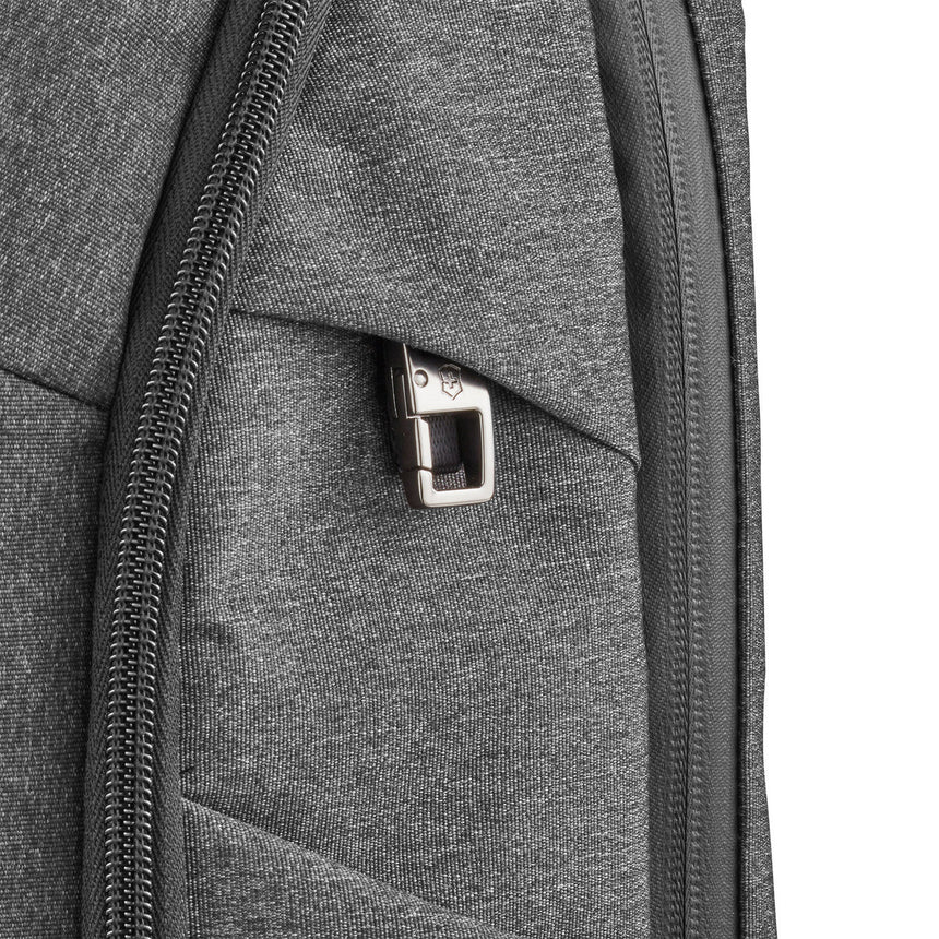 Gray fabric backpack or laptop bag with zipper compartments and a metal buckle detail.