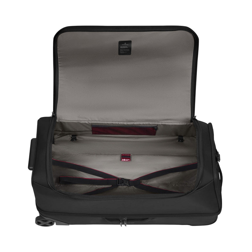 Open suitcase or travel bag with interior compartments visible.