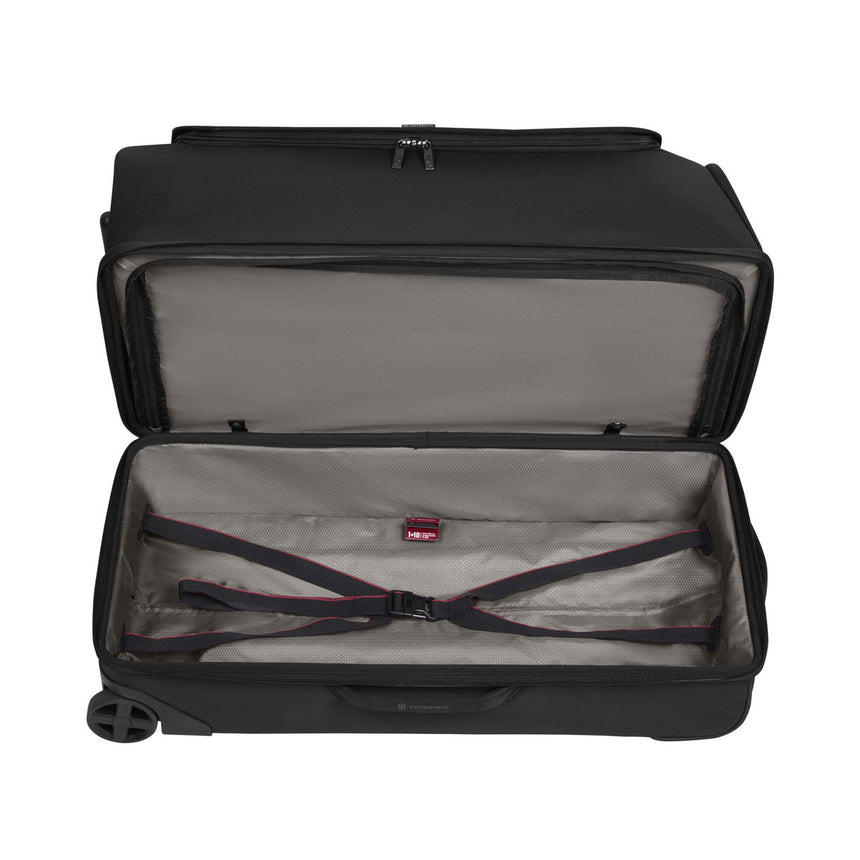 Open suitcase or luggage bag with an interior compartment visible.