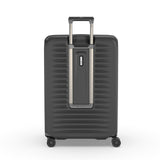 Dark gray hardshell suitcase with a retractable handle and wheels.
