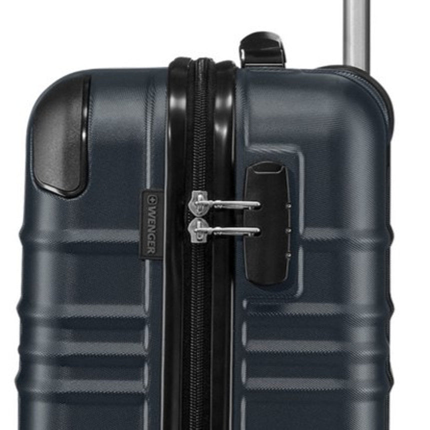 Hard-shell rolling suitcase with a dark blue exterior and zipper closure.