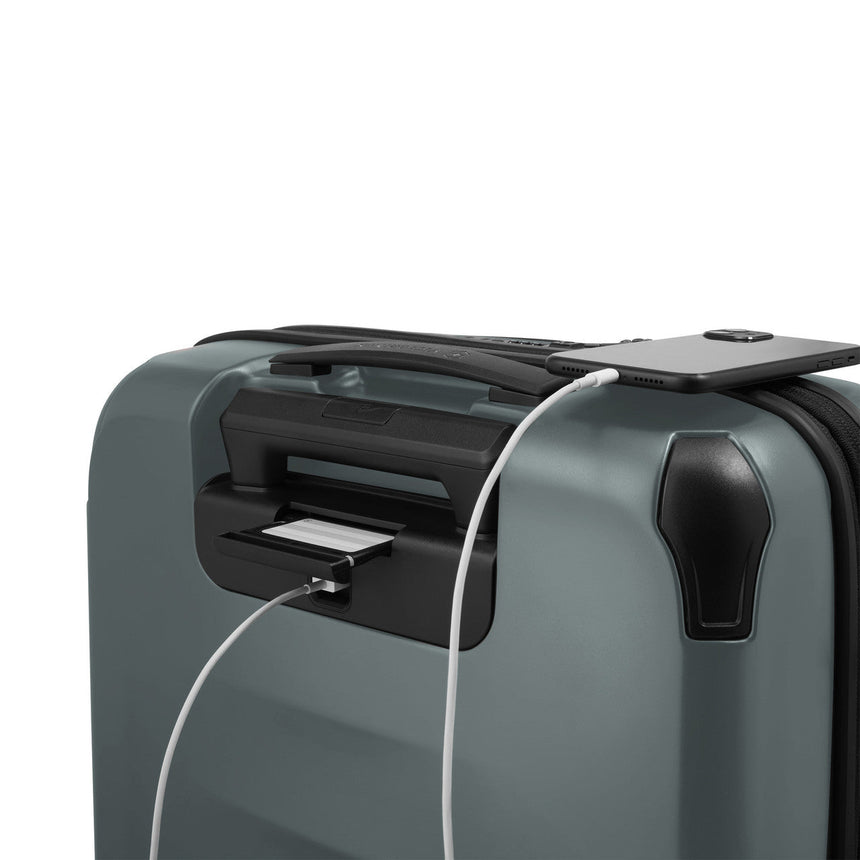 Sleek gray suitcase with a built-in USB charging port.