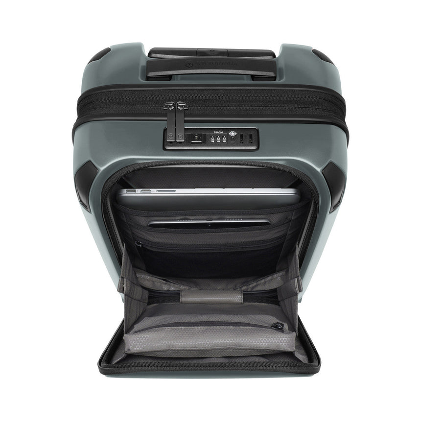 Hard-shell rolling suitcase with an open front compartment.