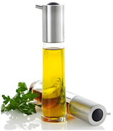 Oil and vinegar dispenser with a stainless steel top and glass body containing yellow oil.