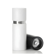 White cylindrical container with a metallic band and removable cap.