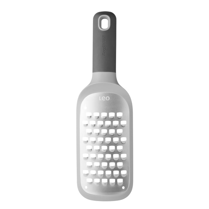Cheese grater with a bottle-shaped design and handle.