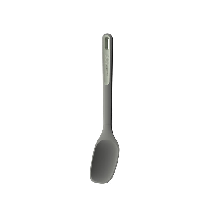 Gray silicone or plastic cooking spatula with a long handle.