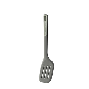Gray plastic slotted spatula with a long handle.