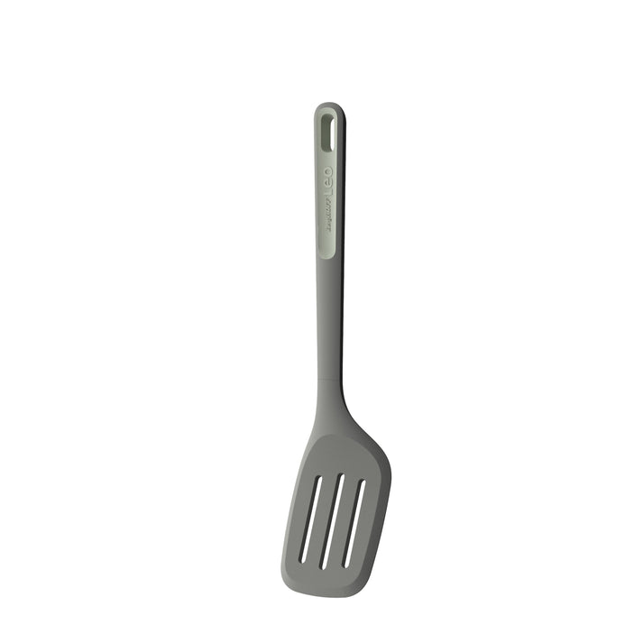 Gray plastic slotted spatula with a long handle.