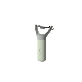 Handheld vegetable peeler with a light green handle and gray blade assembly.