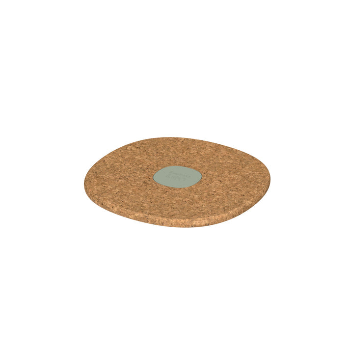 Circular cork trivet or coaster with a small teal center.