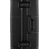 Black hardshell suitcase with combination locks and a handle.
