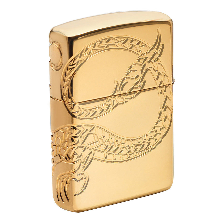 Gold-colored Zippo lighter with an engraved dragon design.