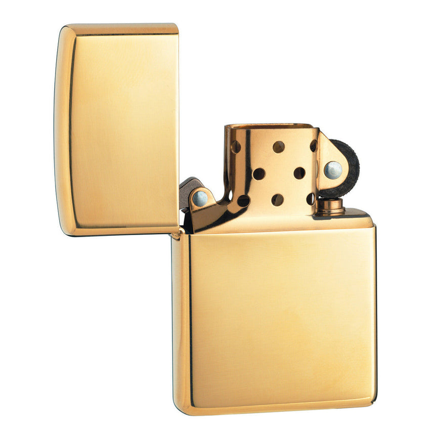 Gold-colored metal flip lighter with a polished finish.