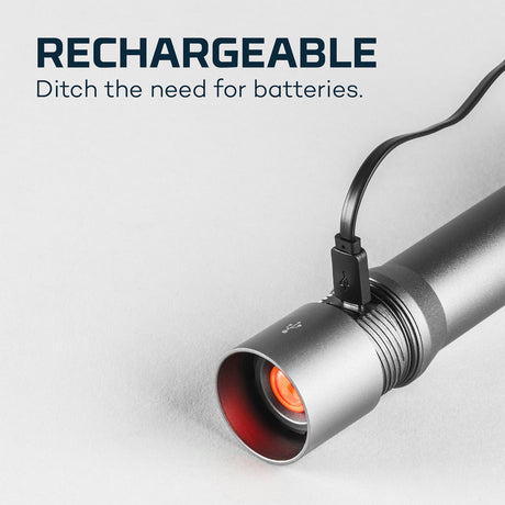 Rechargeable flashlight with a USB charging cable attached.