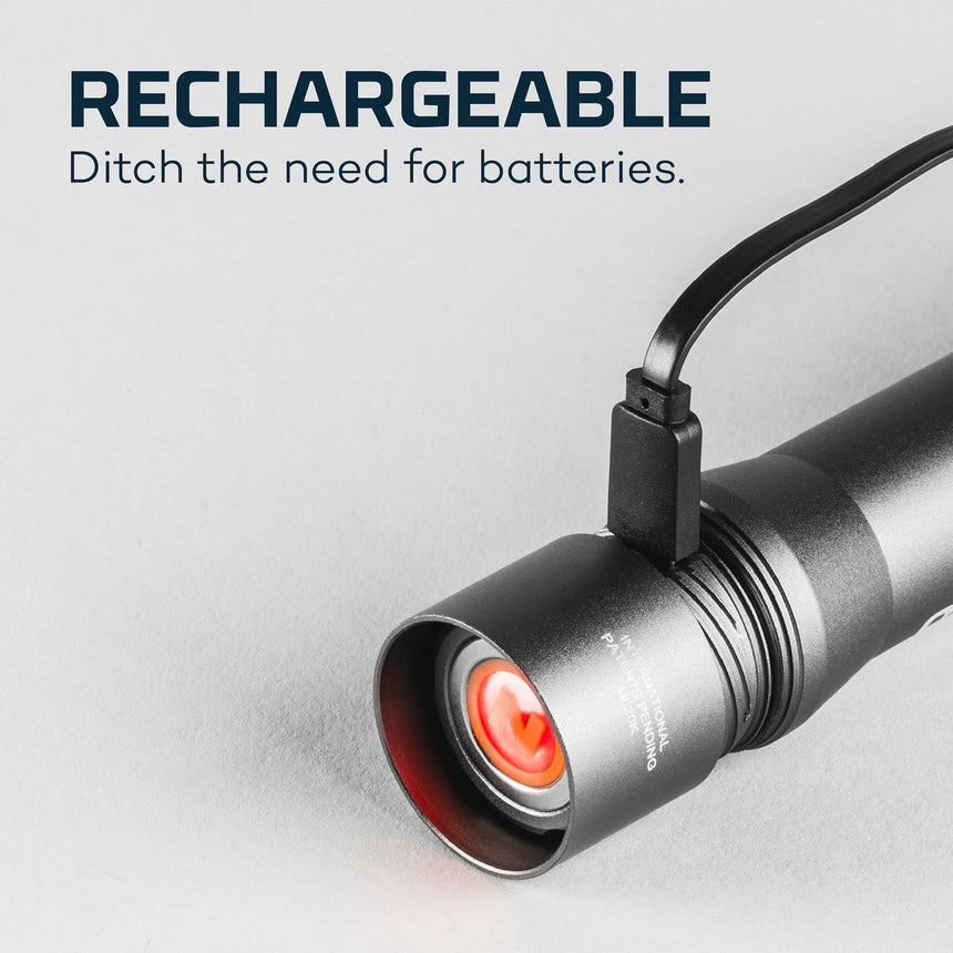 Rechargeable flashlight with a USB charging port and glowing red LED light.
