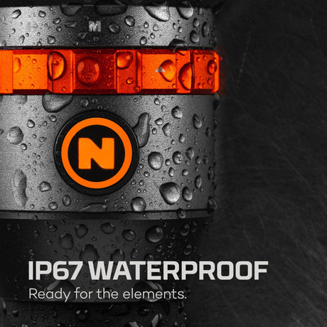 Waterproof electronic device or camera with an orange stripe and ’N’ logo, displaying water droplets on its surface.