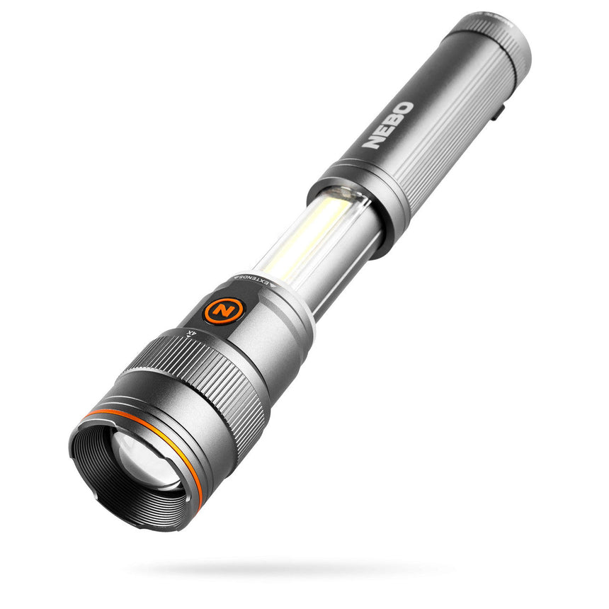 Metallic flashlight with a cylindrical body and adjustable focus beam.