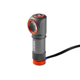 Compact gray and orange flashlight with an adjustable head and attached cord.
