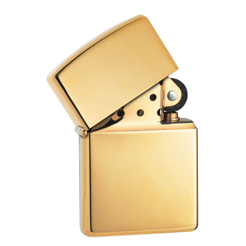 Gold-colored metal flip lighter with the top open.