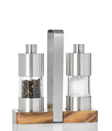 Salt and pepper grinder set with a stainless steel and wood base.