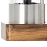 Stainless steel appliance or container with a wooden base.