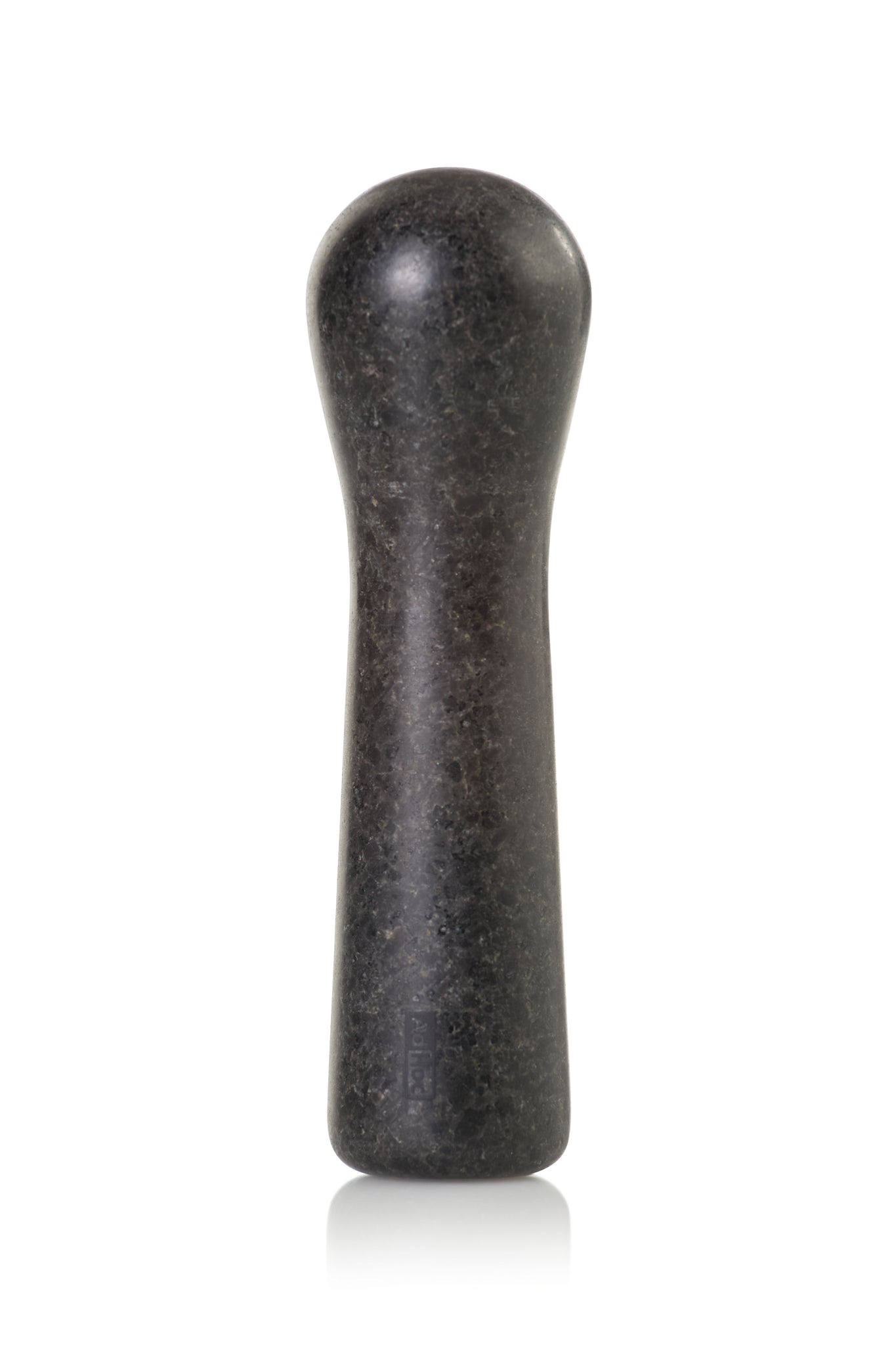 Dark, elongated stone pestle with a rounded top and slightly wider base.