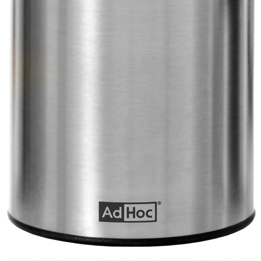 Stainless steel container or canister with ’AdHoc’ branding visible.