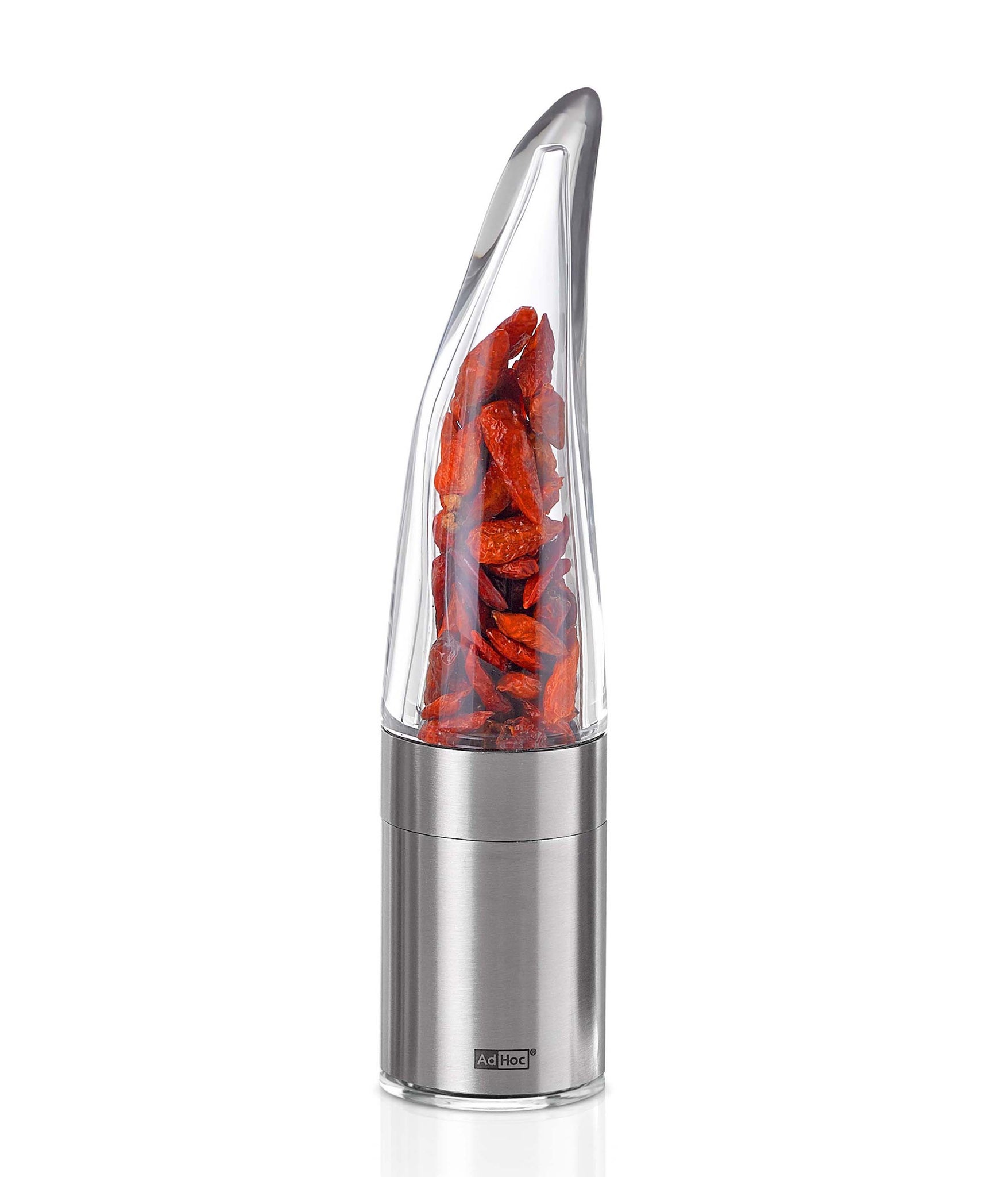 Sleek stainless steel and glass pepper mill or spice grinder with visible red chili peppers inside.