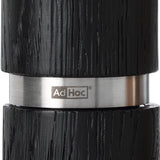 Sleek black and stainless steel pepper mill or grinder with ’AdHoc’ branding.
