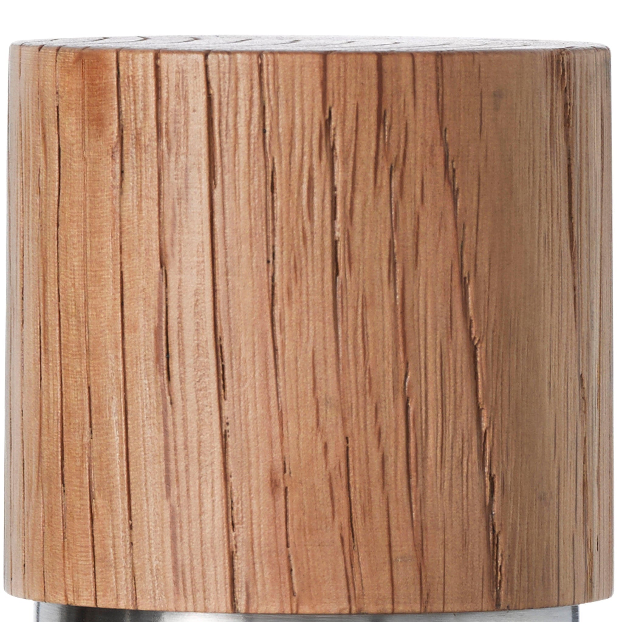Cylindrical wooden object with visible grain and a metallic base.