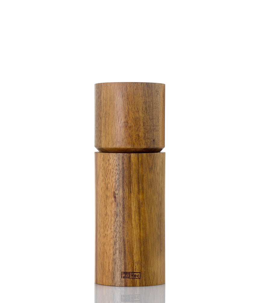 Wooden pepper or salt mill with a cylindrical shape and two-part design.