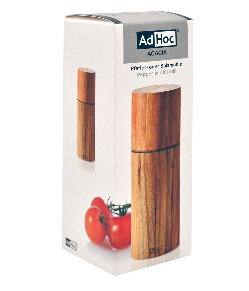 Wooden pepper or salt mill in product packaging.