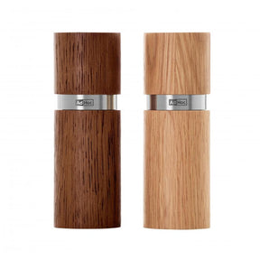 Two wooden pepper or salt mills with metal bands.