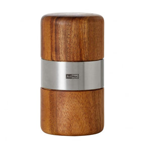 Wooden salt or pepper grinder with a metallic band around the middle.