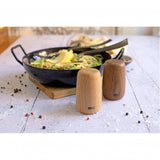 Cast iron skillet filled with pasta and vegetables.