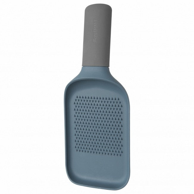 Bottle-shaped kitchen grater with a perforated surface and gray handle.