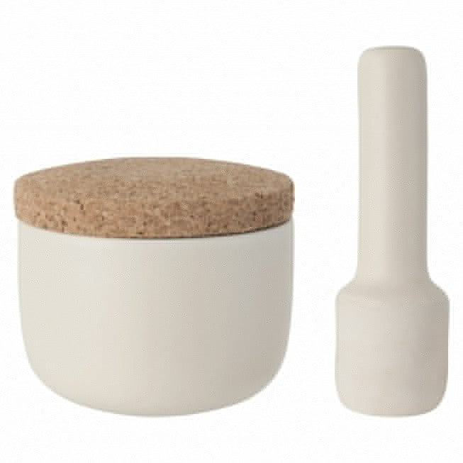 White ceramic container with a cork lid, accompanied by a matching pestle.
