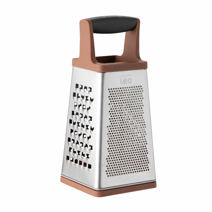 Four-sided stainless steel cheese grater with a copper-colored plastic handle and base.