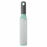 Mint green and white kitchen grater with a dark gray handle.